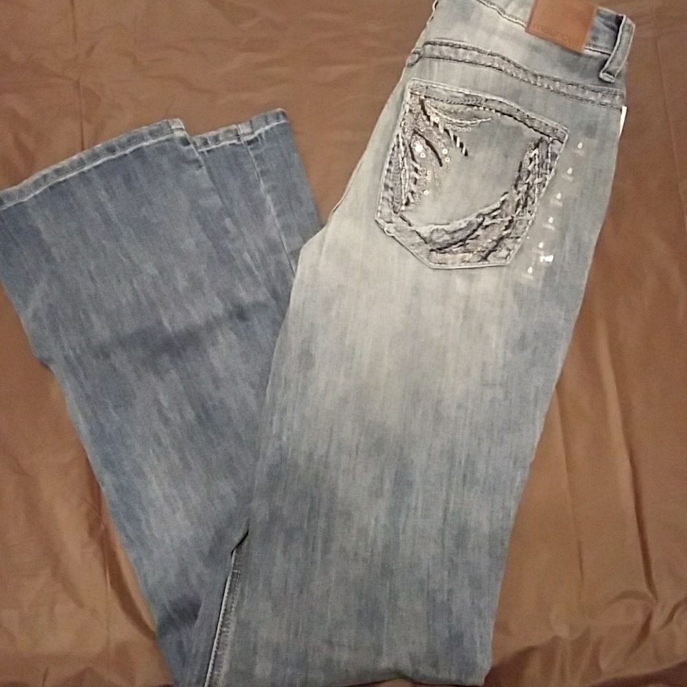 Mid rise slim boot jeans